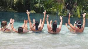 Group enjoying the pool in tulum